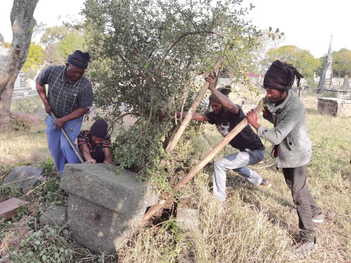 08. Unearthing a toppled gravestone