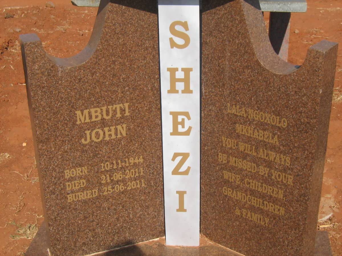 SHEZI Mbuti John 1944-2011