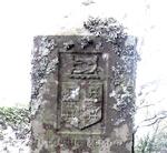 2. Crest at the top of the main headstone
