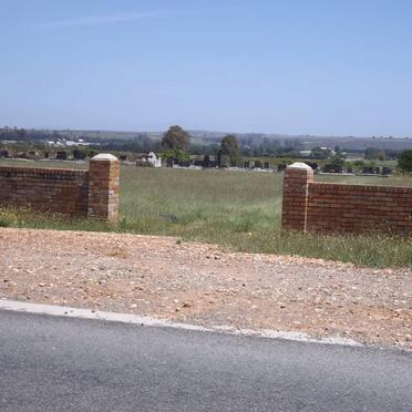 1. On the R324  the entrance gate to the cemetery